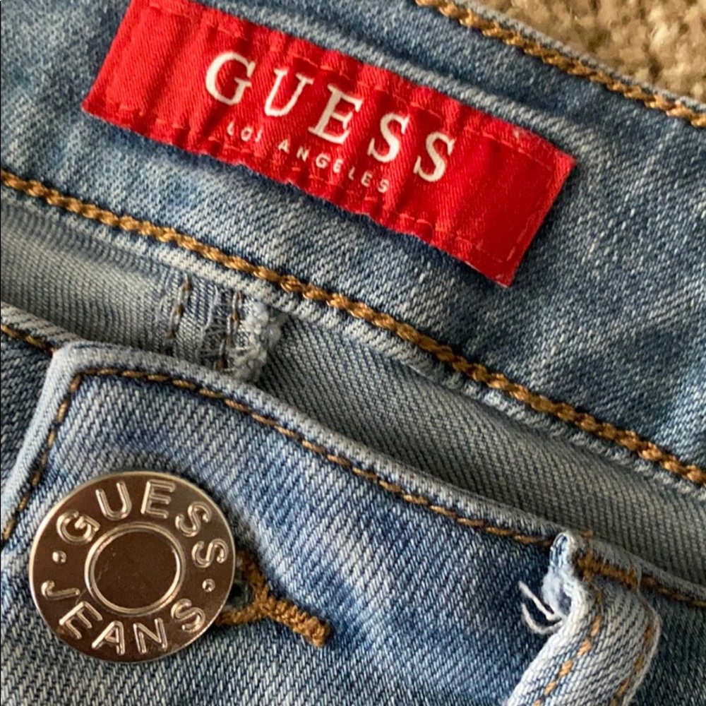 Distressed high waisted light wash Guess jeans